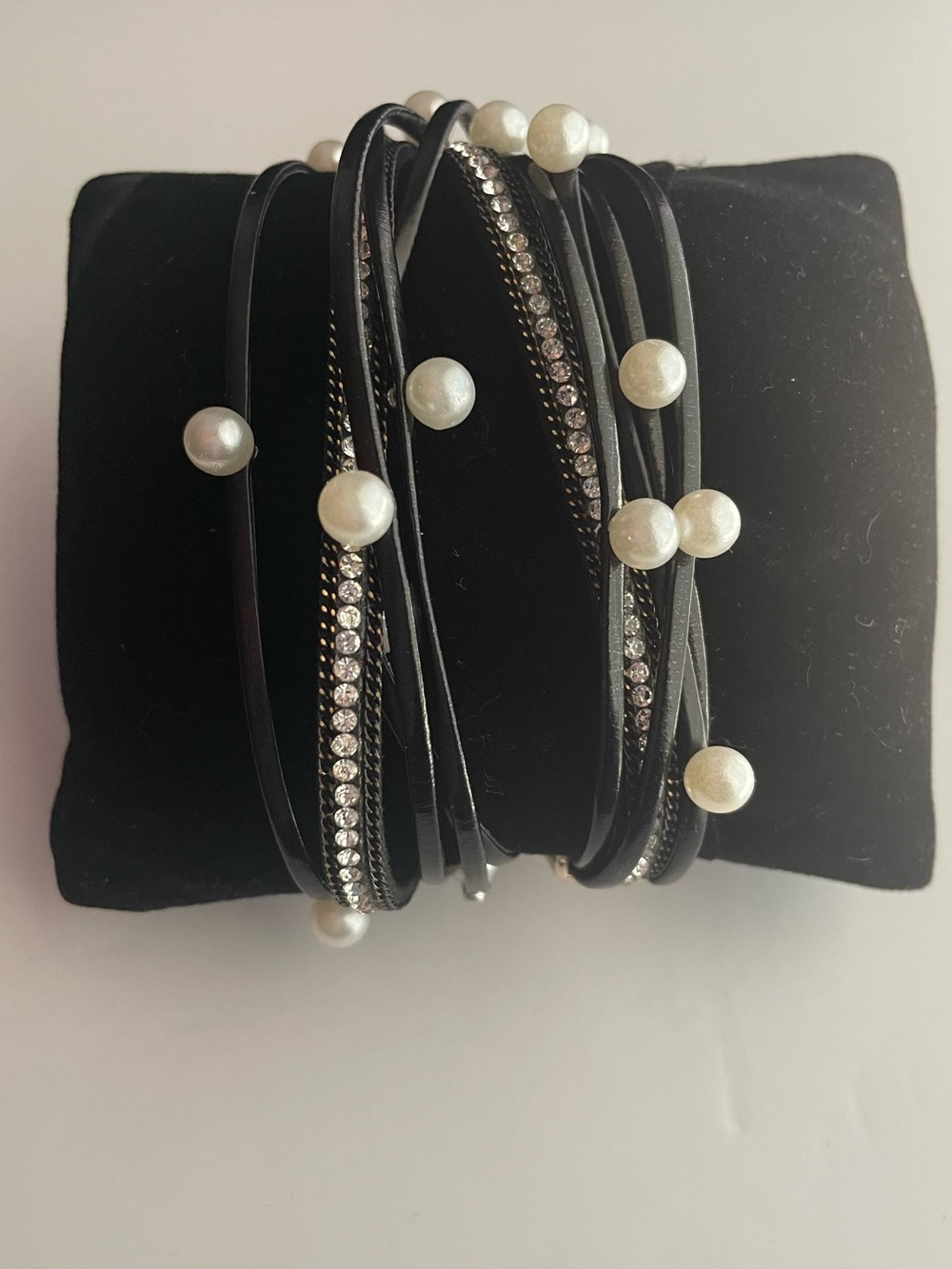 Black Pearl & Crystal Multi-Strand Wrap Bracelet with a gold magnetic closure